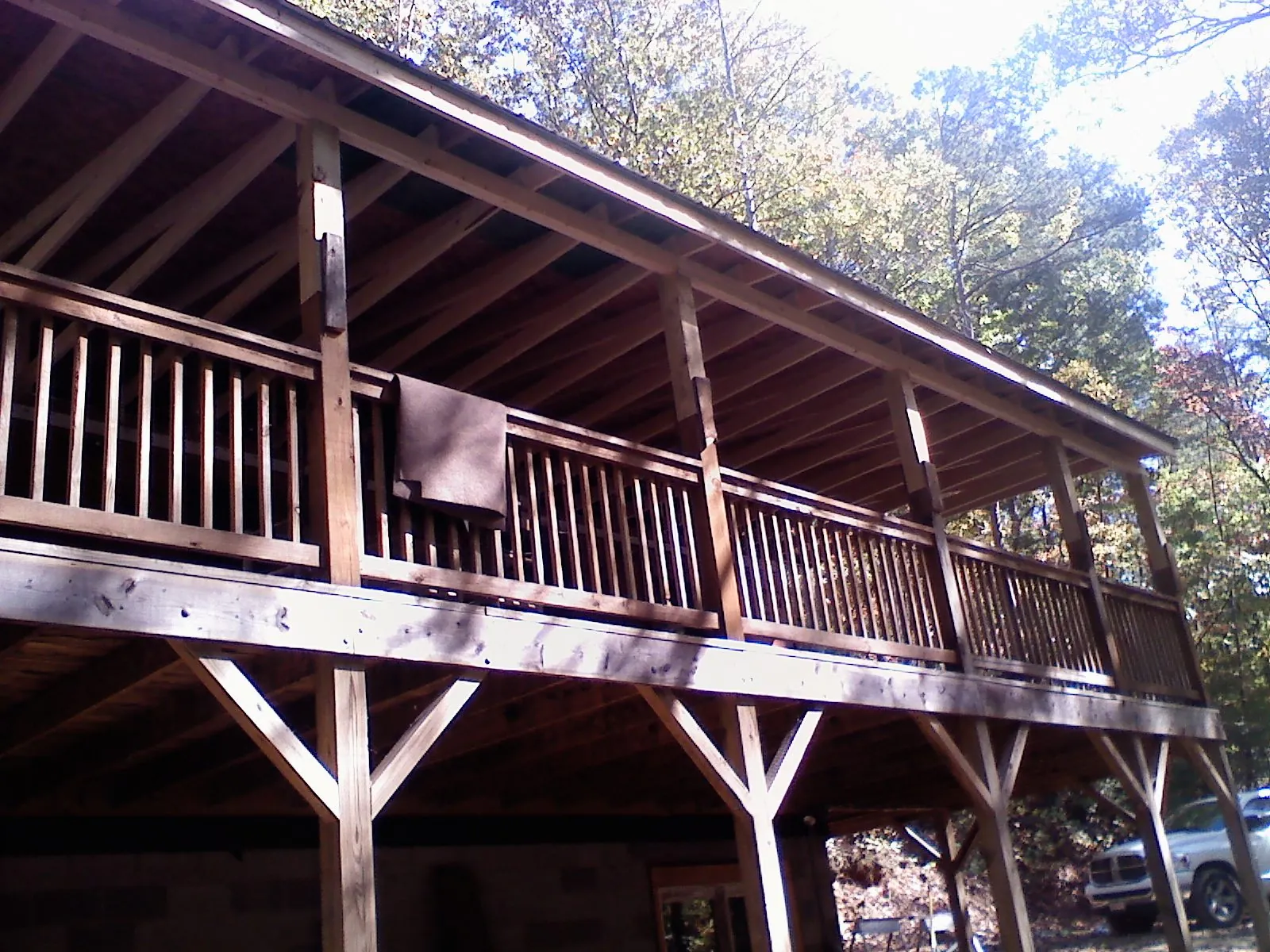 Timber framing under a new elevated porch and deck — Roof Leak Repair in Issaquah by Roofing Brothers